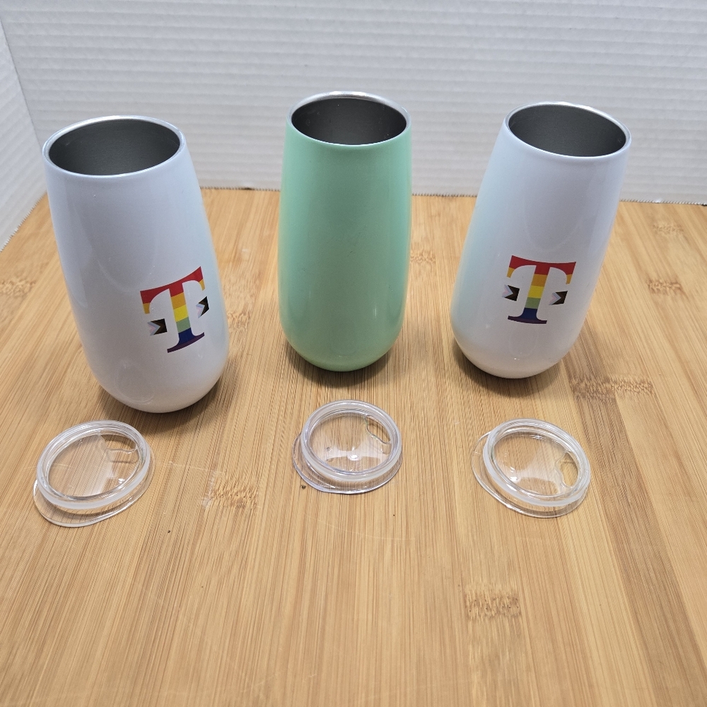 T-Mobile skinny wine tumbler with plastic lid, with with T logo in pride colors